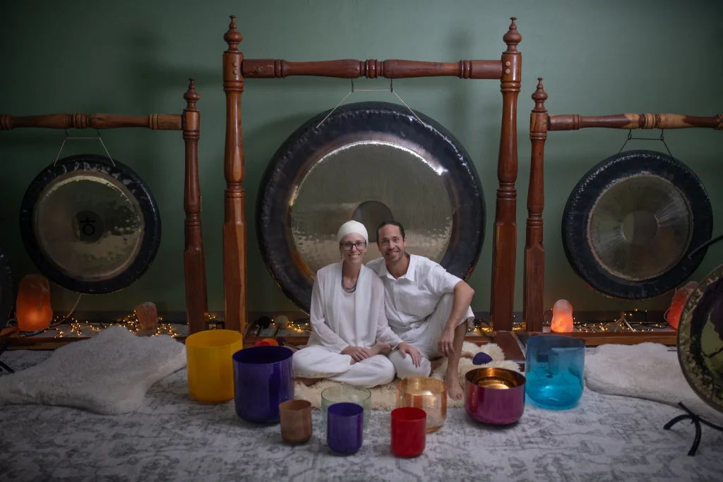 Tara Kaur and Joshua at Sedona Crystal Temple with crystal singing bowls and large gongs
